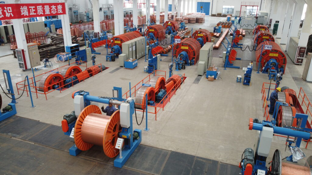 Rigid stranding machine for compacted power cable conductors